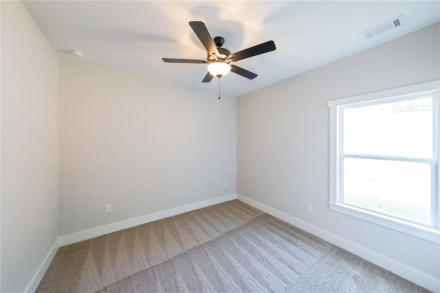 82 Lexie Ct, Rockmart, GA 30153 - carpeted spare room with healthy amount of natural light, a ceiling fan, and baseboards