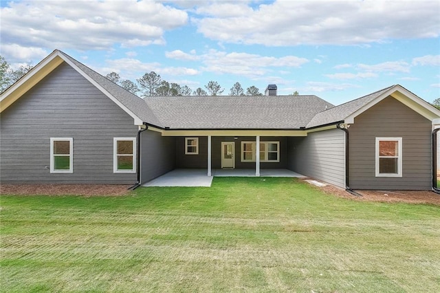 82 Lexie Ct, Rockmart, GA 30153 - back of house with a patio, a lawn, and a chimney