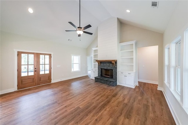 82 Lexie Ct, Rockmart, GA 30153 - unfurnished living room featuring a stone fireplace, ceiling fan, built in shelves, baseboards, and high vaulted ceiling