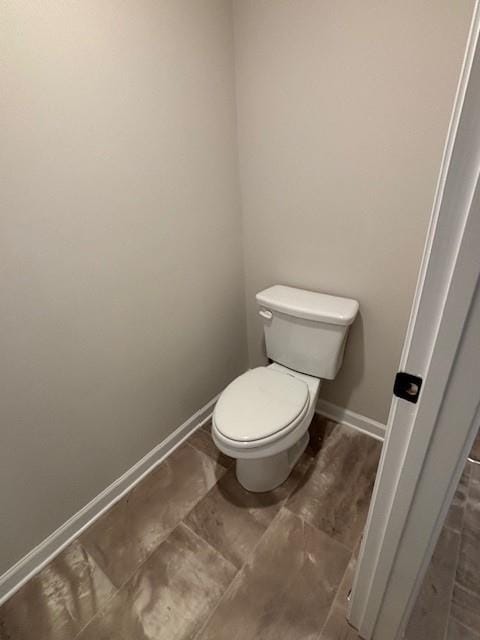 bathroom featuring toilet