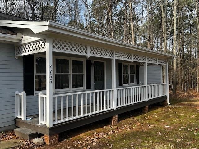 view of home's exterior featuring covered porch