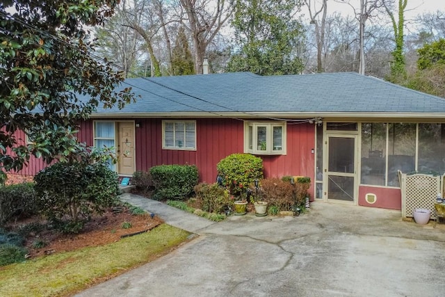 single story home with a sunroom