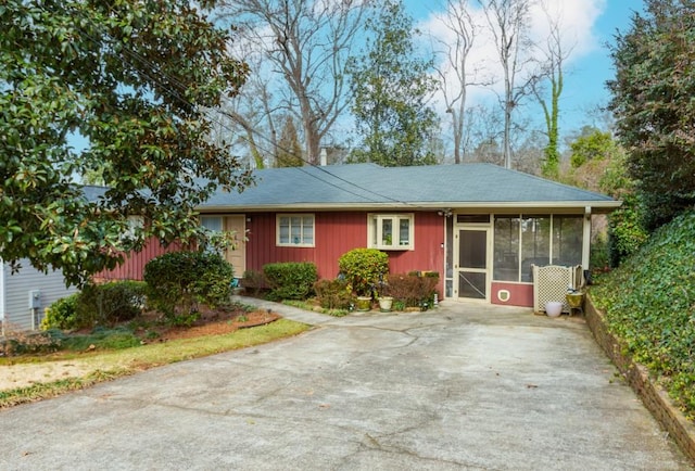 ranch-style home with a sunroom