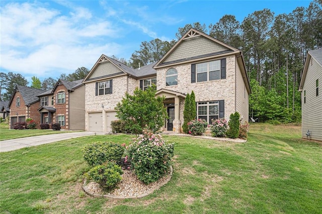 craftsman-style house featuring a garage and a front yard