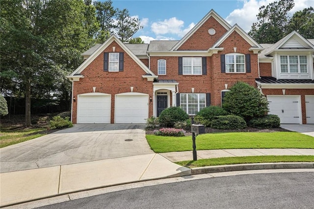 25 Hampreston Ct, Johns Creek, GA 30022 - view of front of house with concrete driveway, brick siding, and an attached garage