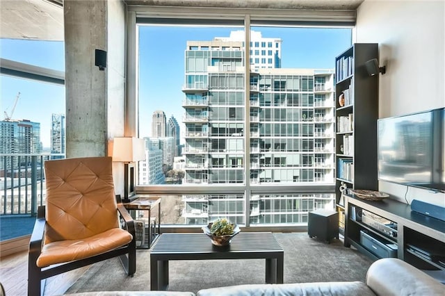 interior space with a view of city and floor to ceiling windows