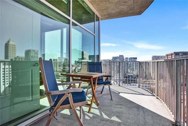 balcony featuring a view of city