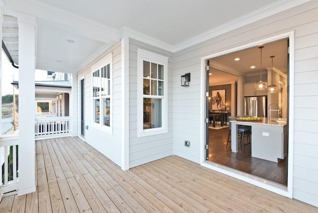 wooden deck with sink