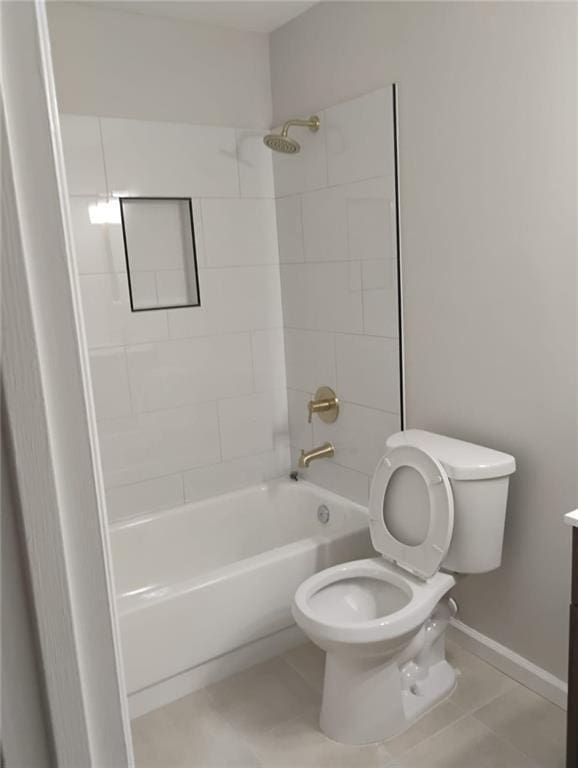 2645 Trotters Walk Trl, Snellville, GA 30078 - bathroom featuring toilet, shower / bath combination, vanity, baseboards, and tile patterned floors