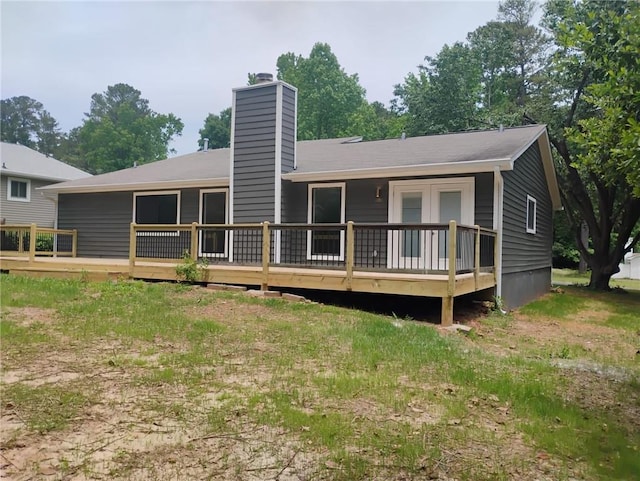 2645 Trotters Walk Trl, Snellville, GA 30078 - back of house with a deck and a chimney