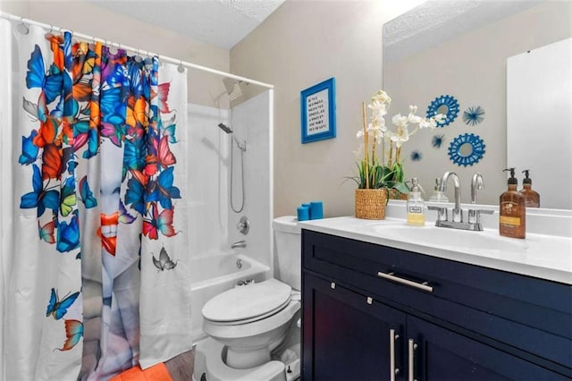 bathroom with toilet, vanity, a textured ceiling, and shower / bath combo with shower curtain