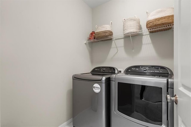 laundry room with washer and dryer