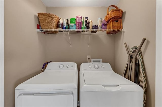 laundry area with laundry area and washing machine and dryer