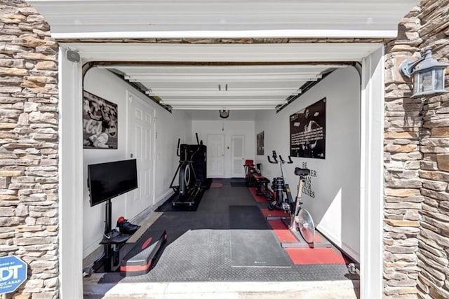 workout room with a garage