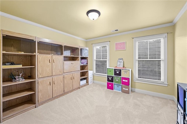 bedroom with ornamental molding, baseboards, and light carpet