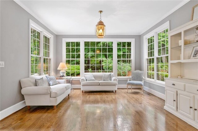 775 Barberry Dr, Milton, GA 30004 - dining space featuring a chandelier, a decorative wall, dark wood-style flooring, a wainscoted wall, and ornamental molding