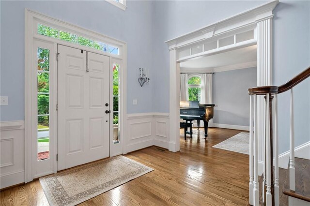 775 Barberry Dr, Milton, GA 30004 - living room featuring ornamental molding, wood finished floors, baseboards, and a chandelier
