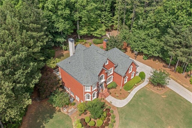 775 Barberry Dr, Milton, GA 30004 - living room with a chandelier, high vaulted ceiling, carpet floors, a fireplace, and baseboards
