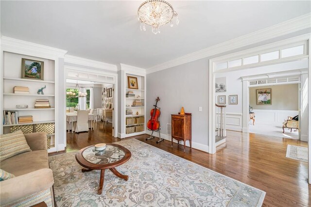 775 Barberry Dr, Milton, GA 30004 - bathroom with a chandelier, a shower stall, vanity, ornamental molding, and a walk in closet