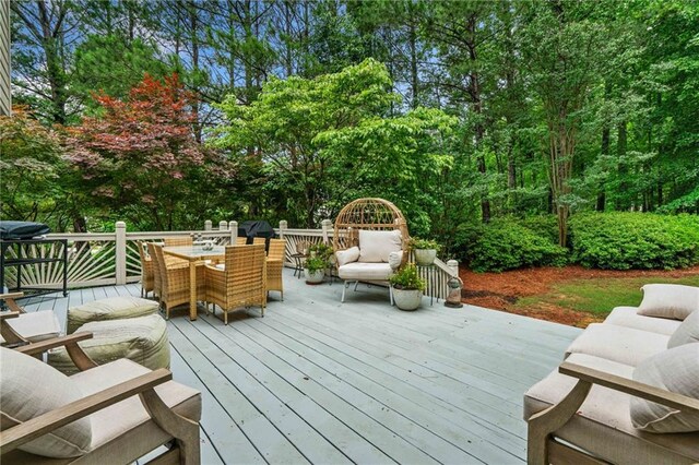 775 Barberry Dr, Milton, GA 30004 - back of property at dusk with a deck, a chimney, and a lawn
