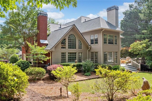 775 Barberry Dr, Milton, GA 30004 - view of front of house featuring a front lawn and brick siding