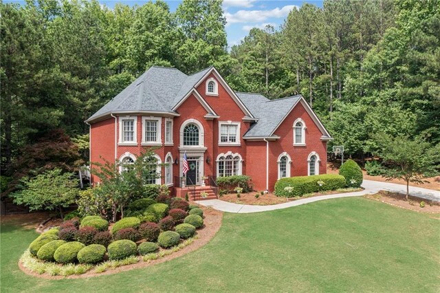775 Barberry Dr, Milton, GA 30004 - aerial view of a forest and a large body of water