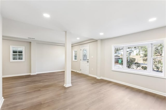 basement featuring wood-type flooring