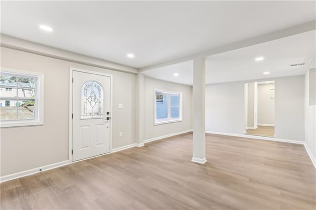 foyer entrance featuring light hardwood / wood-style flooring