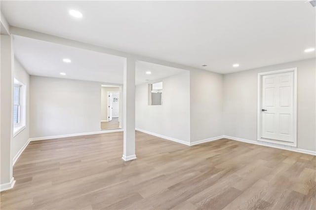 basement featuring light hardwood / wood-style flooring