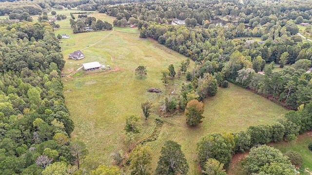 birds eye view of property featuring a rural view