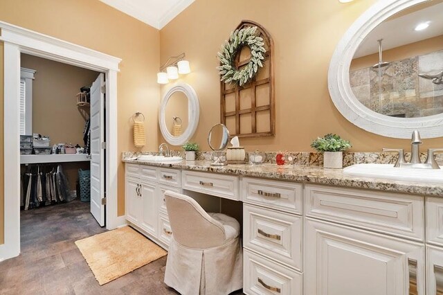 bathroom featuring a shower and vanity