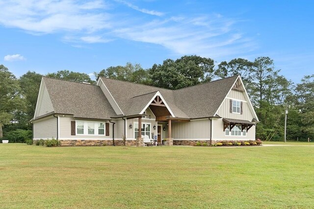 craftsman inspired home with a front yard