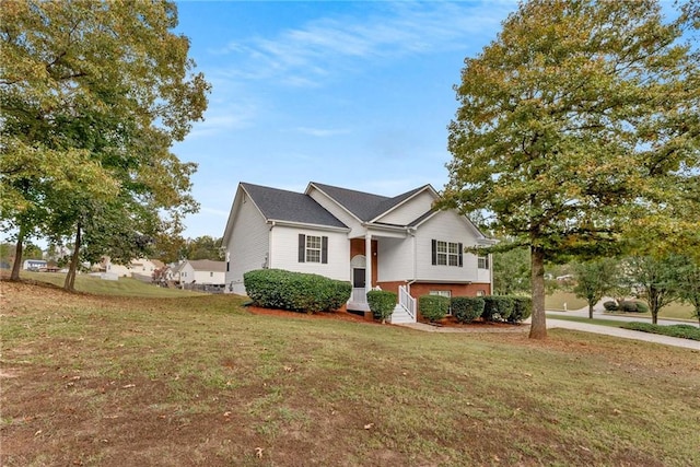 bi-level home featuring a front yard