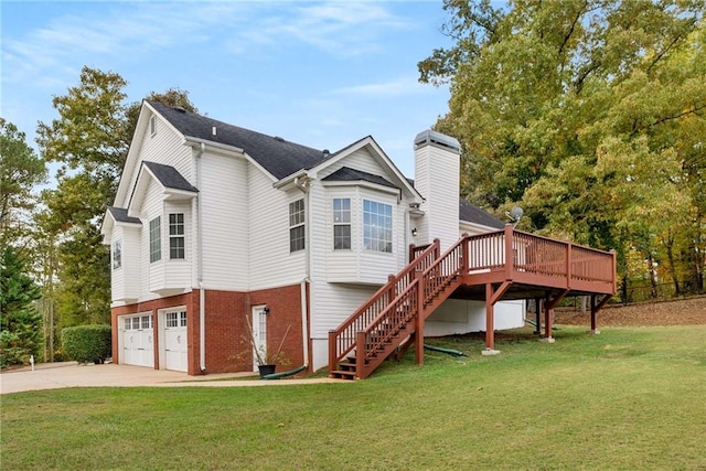 view of side of property with brick siding, a yard, concrete driveway, a garage, and stairs