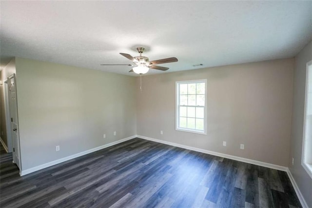 212 Cobb St, Cedartown, GA 30125 - empty room with baseboards, a ceiling fan, and dark wood-style floors