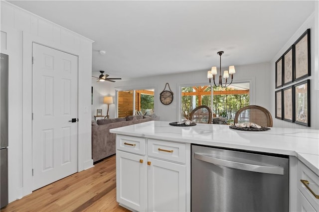 6160 Lake Lanier Heights Rd, Buford, GA 30518 - kitchen featuring stainless steel dishwasher, white cabinetry, a chandelier, light wood-type flooring, and a peninsula