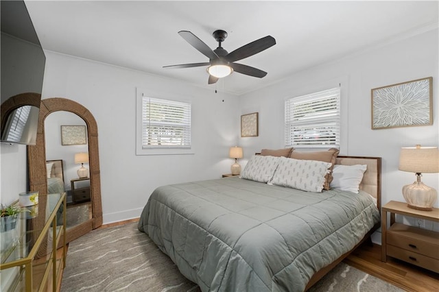 6160 Lake Lanier Heights Rd, Buford, GA 30518 - bedroom featuring multiple windows, wood finished floors, crown molding, and ceiling fan