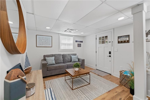 6160 Lake Lanier Heights Rd, Buford, GA 30518 - living area with wood finished floors, a paneled ceiling, and recessed lighting