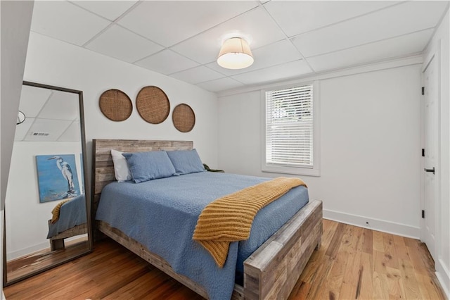 6160 Lake Lanier Heights Rd, Buford, GA 30518 - bedroom with light wood-style flooring and a drop ceiling