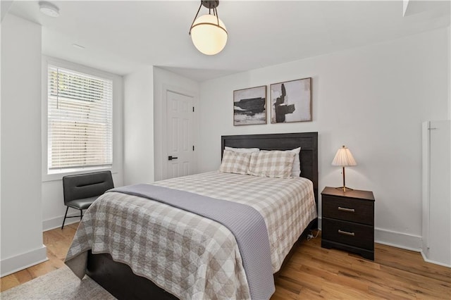 6160 Lake Lanier Heights Rd, Buford, GA 30518 - bedroom featuring light wood-style floors and baseboards