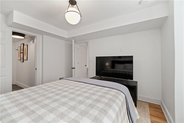 6160 Lake Lanier Heights Rd, Buford, GA 30518 - bedroom featuring wood finished floors and baseboards