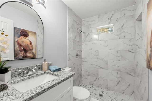 1245 Meriwether St, Griffin, GA 30224 - full bath featuring toilet, vanity, and a tile shower