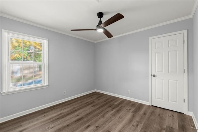 1245 Meriwether St, Griffin, GA 30224 - spare room with wood finished floors, a ceiling fan, ornamental molding, and baseboards