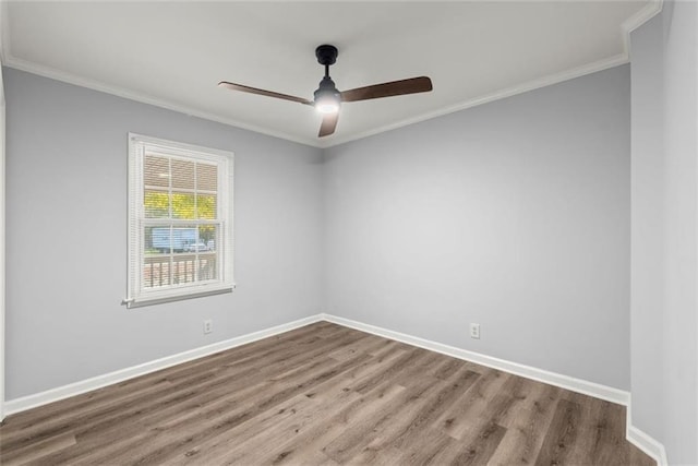 1245 Meriwether St, Griffin, GA 30224 - unfurnished room with wood finished floors, baseboards, crown molding, and ceiling fan