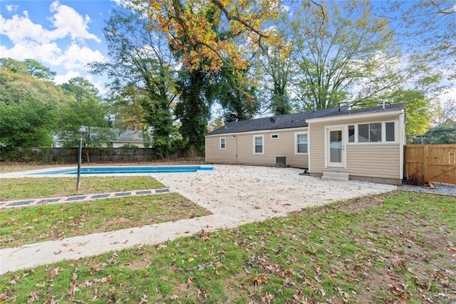 1245 Meriwether St, Griffin, GA 30224 - back of house with entry steps and a patio area
