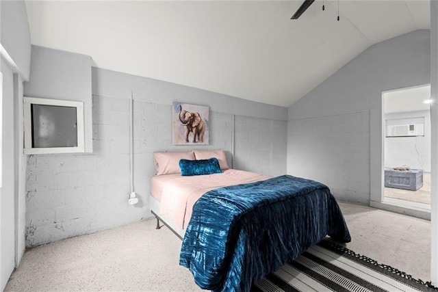 1245 Meriwether St, Griffin, GA 30224 - bedroom featuring vaulted ceiling, concrete block wall, and a ceiling fan