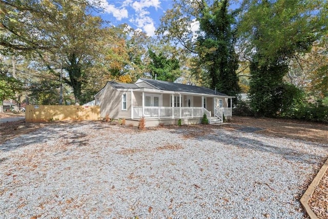 1245 Meriwether St, Griffin, GA 30224 - view of front of house with covered porch and view of wooded area