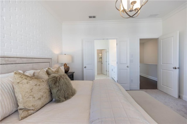 510 Healy Dr Unit 71, Cumming, GA 30040 - carpeted bedroom with a chandelier, visible vents, brick wall, and ornamental molding
