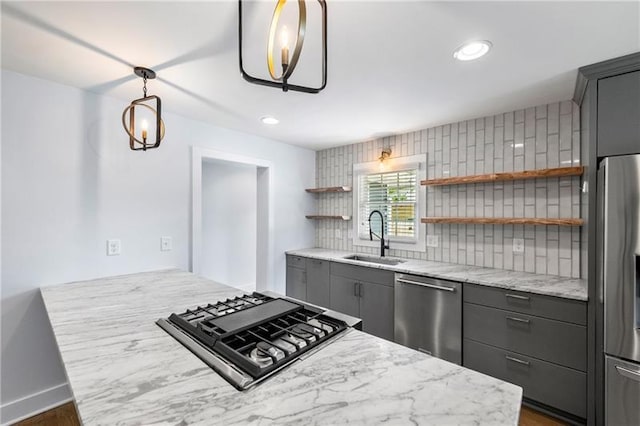 957 Sharon Cir SE, Smyrna, GA 30080 - kitchen featuring a sink, appliances with stainless steel finishes, gray cabinetry, open shelves, and decorative backsplash