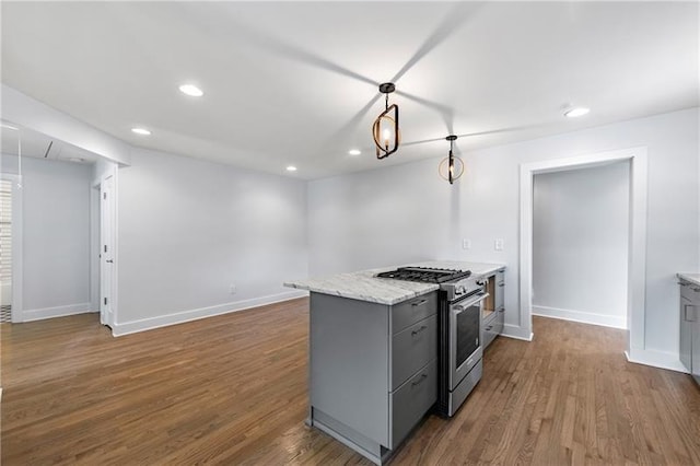 957 Sharon Cir SE, Smyrna, GA 30080 - kitchen with stainless steel range, gray cabinets, recessed lighting, dark wood-type flooring, and baseboards
